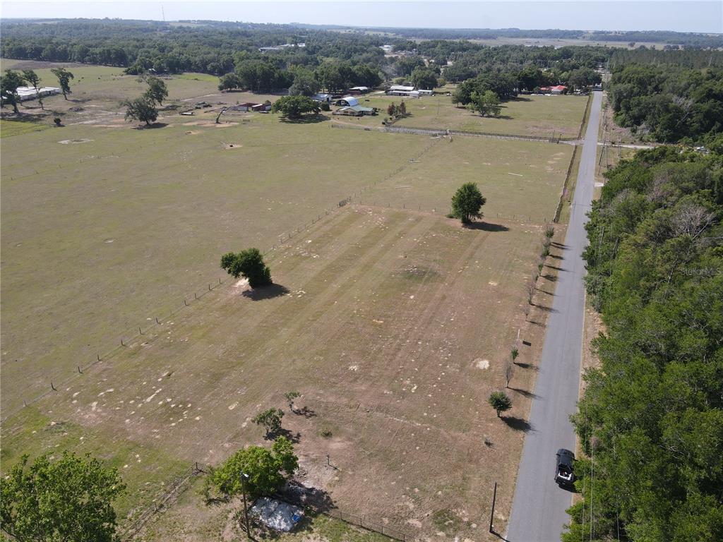 1 Smith Road Dade City, FL 33525 - Photo 12 of 25 an aerial view of ocean and residential houses