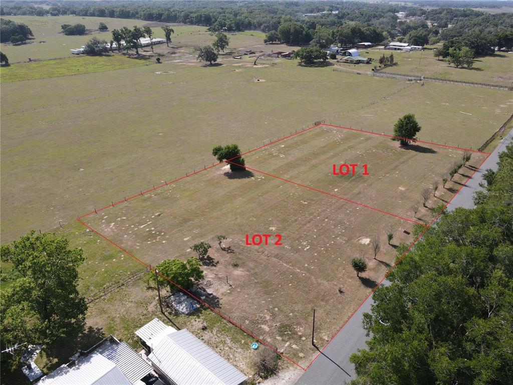 1 Smith Road Dade City, FL 33525 - Photo 5 of 25 an aerial view of residential houses with outdoor space