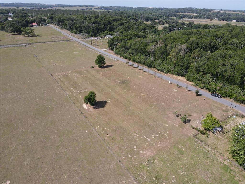 1 Smith Road Dade City, FL 33525 - Photo 10 of 25 an aerial view of a house with a yard