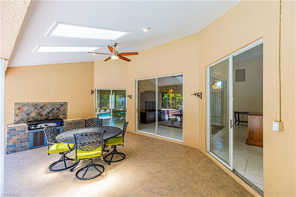 2100 Piccadilly Circus Naples, FL 34112 - Photo 13 of 30 a living room with furniture and a table