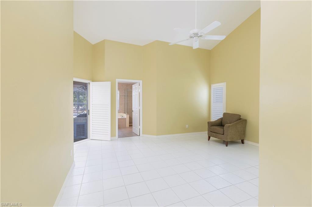 2100 Piccadilly Circus Naples, FL 34112 - Photo 15 of 30 a view of a room with a bench