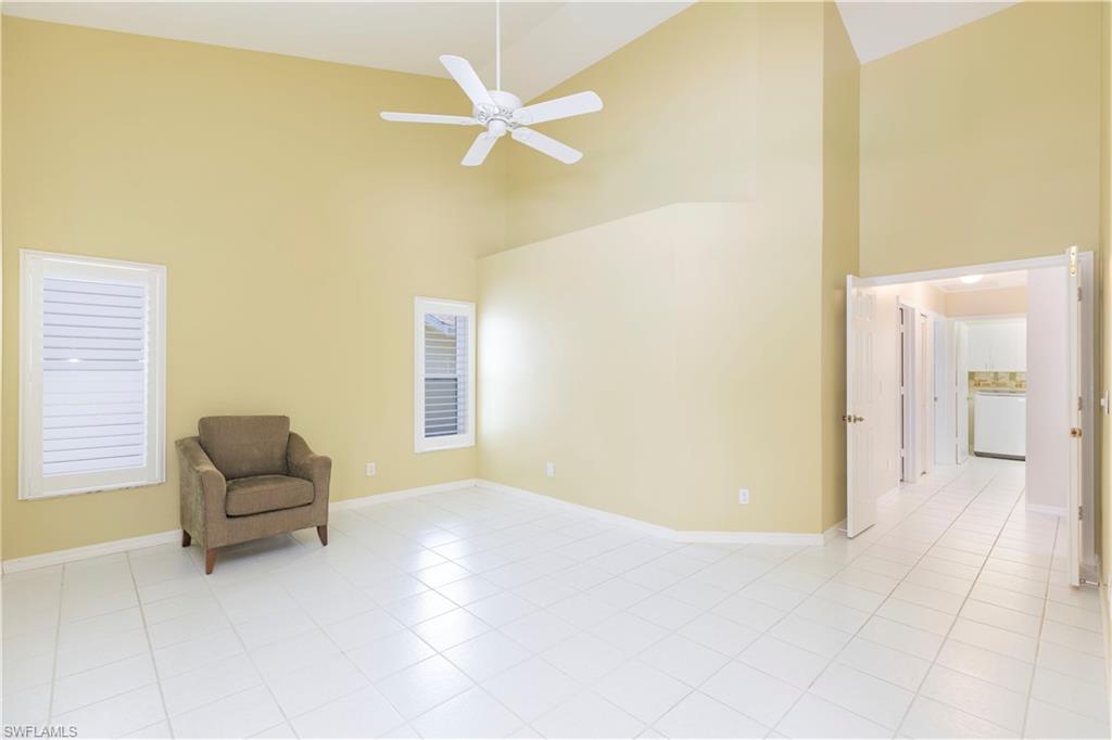 2100 Piccadilly Circus Naples, FL 34112 - Photo 16 of 30 a living room with furniture and a window