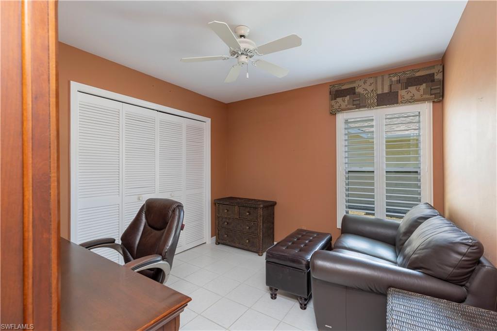 2100 Piccadilly Circus Naples, FL 34112 - Photo 21 of 30 a work room with furniture and a window