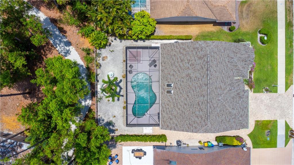 2100 Piccadilly Circus Naples, FL 34112 - Photo 25 of 30 an aerial view of a house with a garden