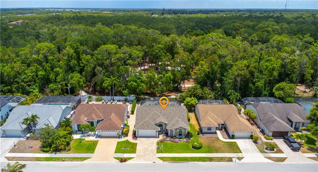 2100 Piccadilly Circus Naples, FL 34112 - Photo 27 of 30 an aerial view of a house with garden space and street view