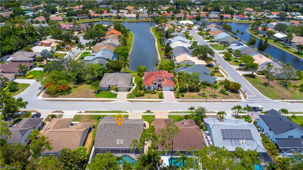 2100 Piccadilly Circus Naples, FL 34112 - Photo 28 of 30 an aerial view of residential houses with outdoor space and swimming pool