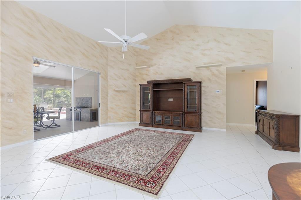 2100 Piccadilly Circus Naples, FL 34112 - Photo 6 of 30 a living room with furniture and a rug