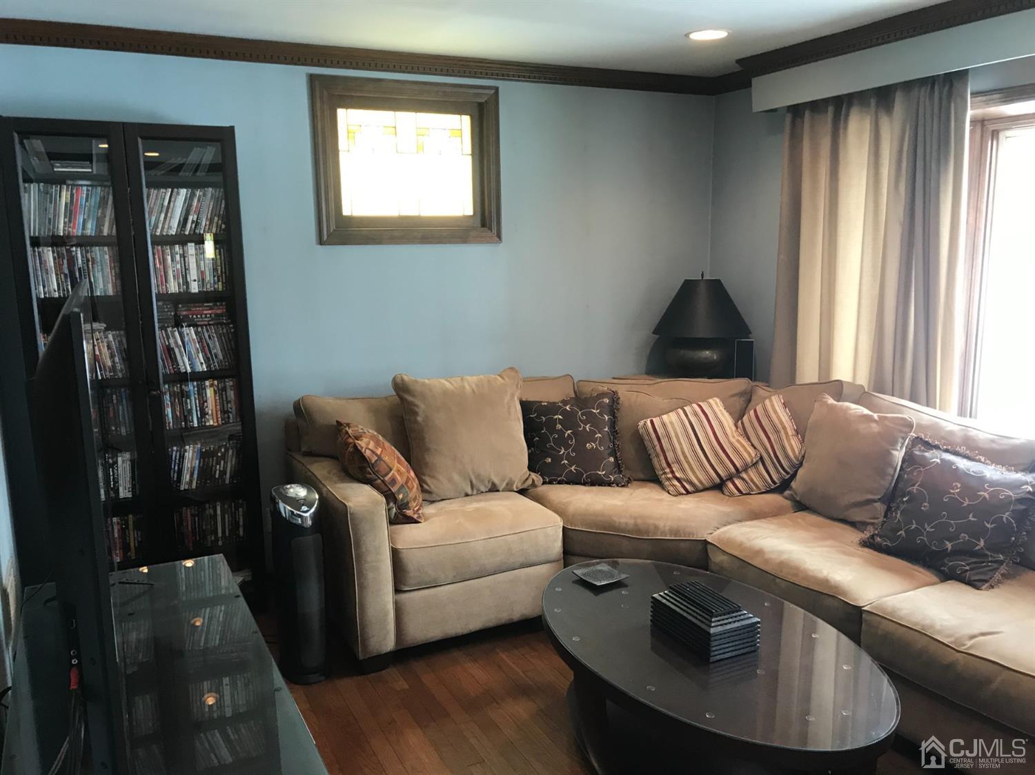 10 Wilcox Road New Brunswick, NJ 08901 - Photo 3 of 41 a living room with furniture and a window