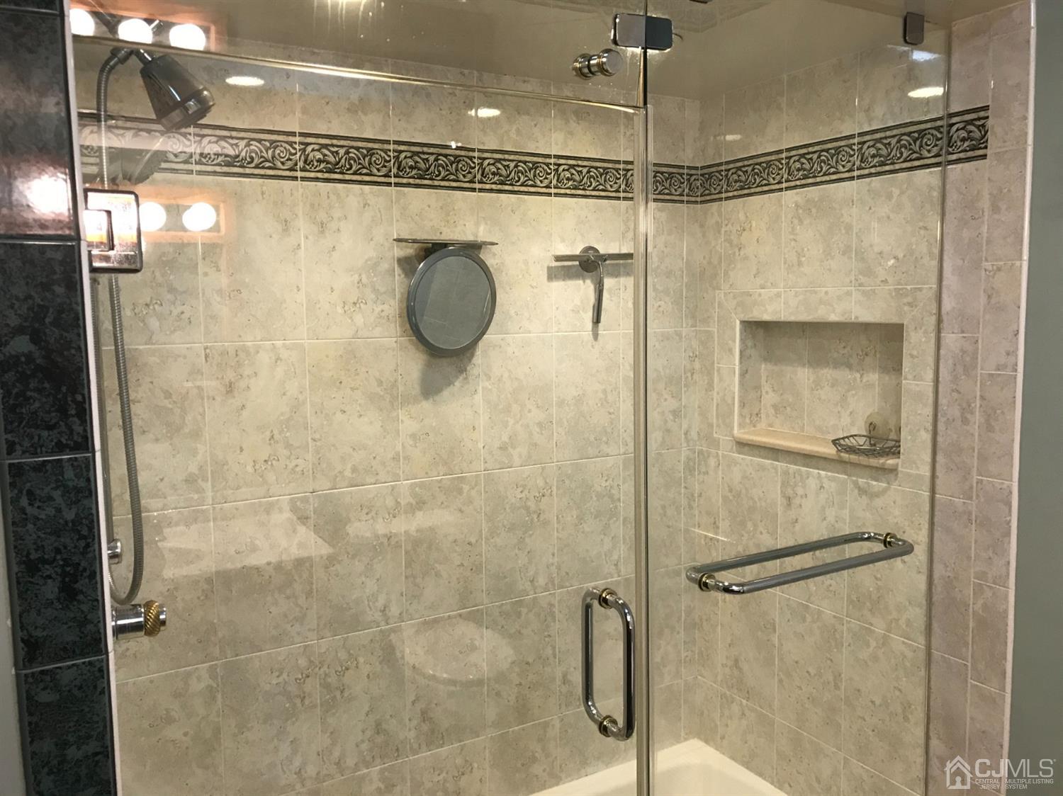 10 Wilcox Road New Brunswick, NJ 08901 - Photo 7 of 41 a bathroom with a shower and a shower