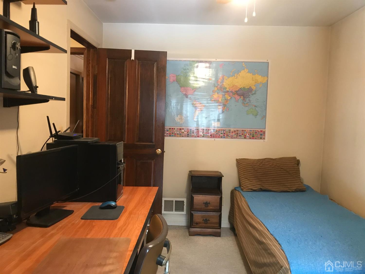 10 Wilcox Road New Brunswick, NJ 08901 - Photo 10 of 41 a room with furniture and a window