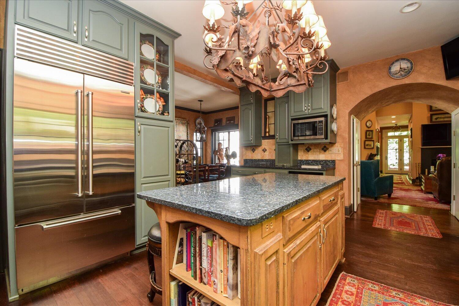 2412 Robin Hood Road Southeast Roanoke, VA 24014 - Photo 12 of 59 a kitchen with stainless steel appliances granite countertop a sink a counter space and a window