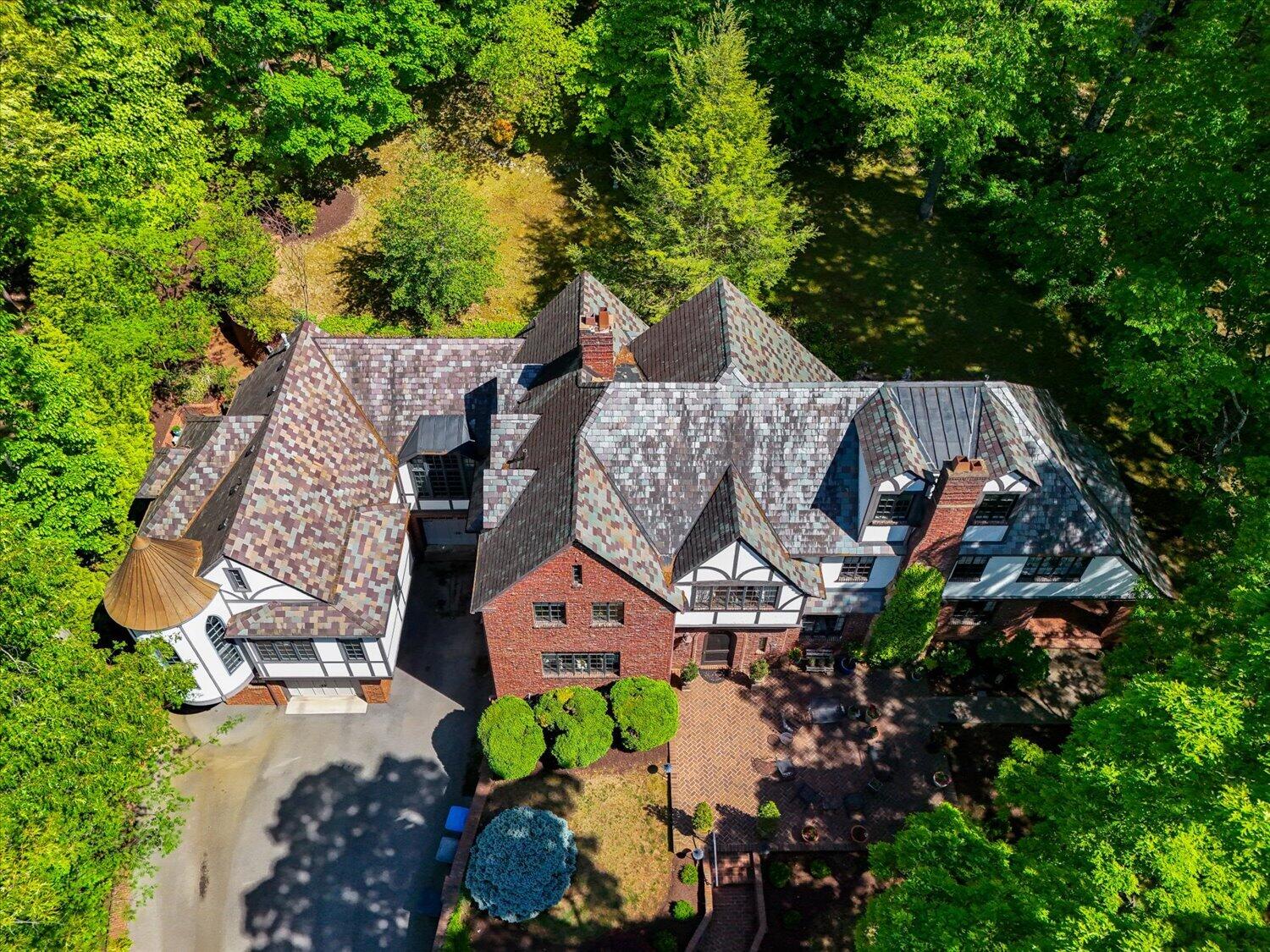 2412 Robin Hood Road Southeast Roanoke, VA 24014 - Photo 2 of 59 an aerial view of a house with a yard and lake view