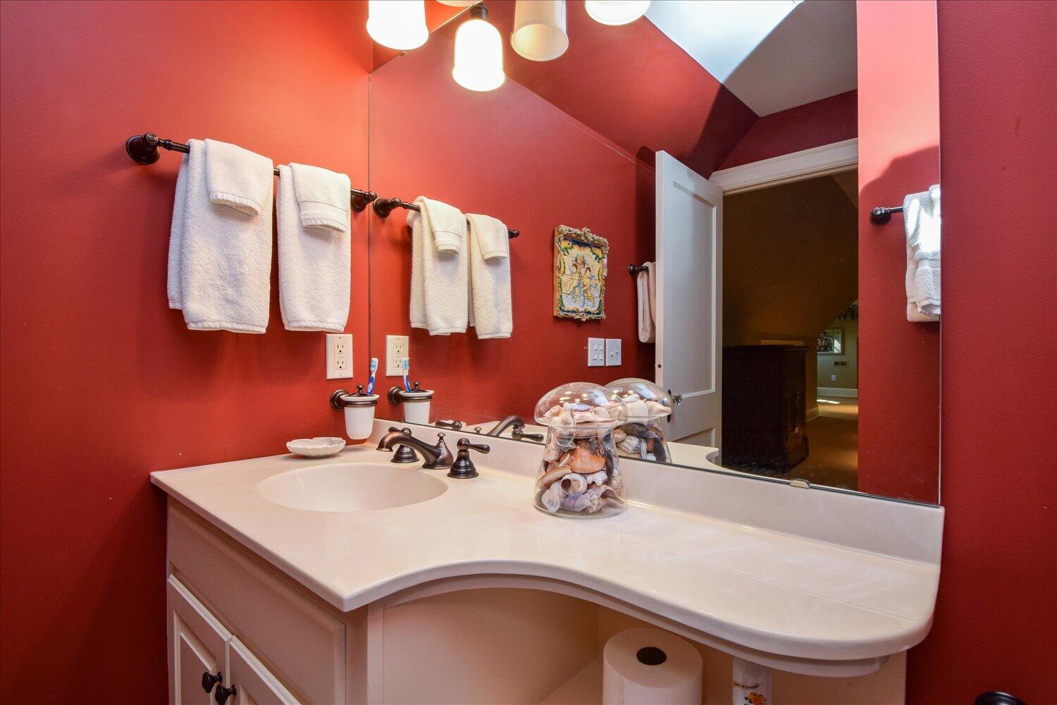 2412 Robin Hood Road Southeast Roanoke, VA 24014 - Photo 46 of 59 a bathroom with a sink a mirror and a toilet