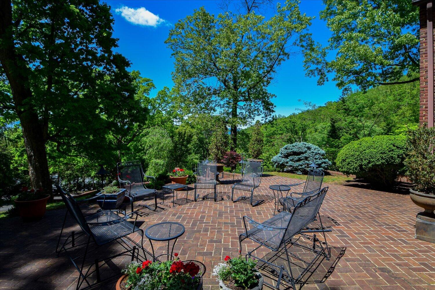 2412 Robin Hood Road Southeast Roanoke, VA 24014 - Photo 48 of 59 a view of a patio with chairs and potted plants