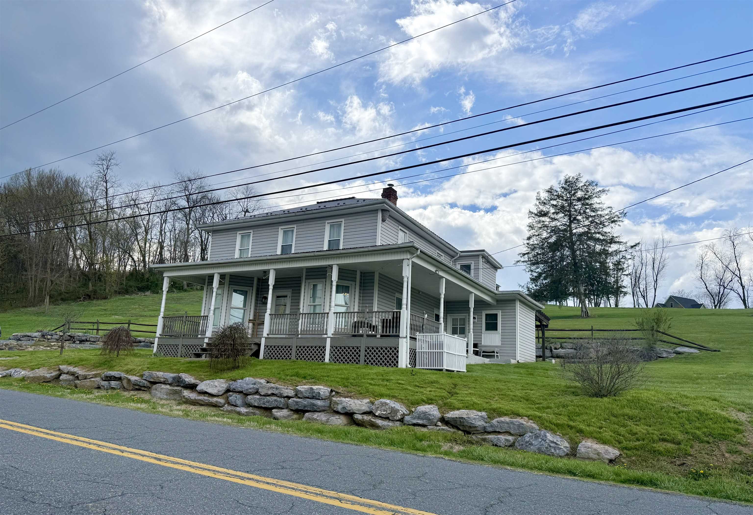 15385 Evergreen Valley Road Timberville, VA 22853 - Photo 36 of 44 a front view of a house with a garden