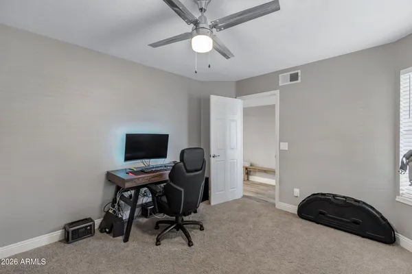 a workspace with a bookshelf