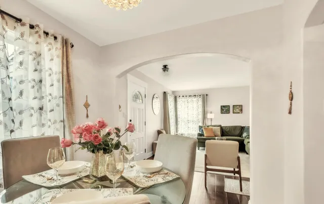 a kitchen with stainless steel appliances granite countertop a stove a sink dishwasher and a refrigerator