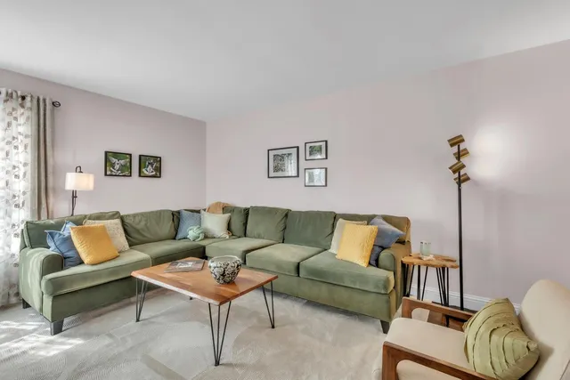 a living room with furniture and a couch