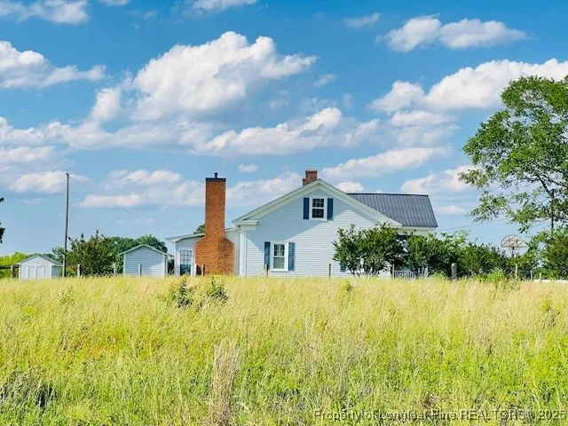 a house view with a garden