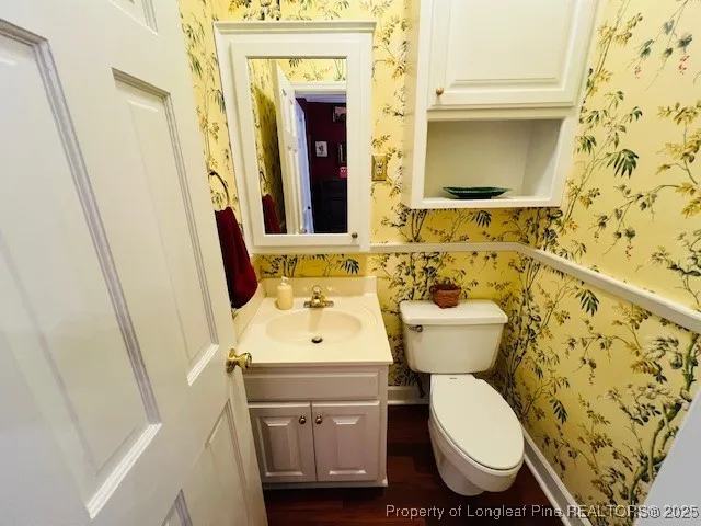 a bathroom with a sink and a toilet
