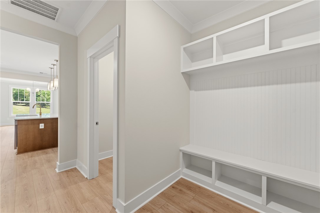 203 Timothy Court Anderson, SC 29621 - Photo 10 of 40 Functional built-in storage and bench seating define this practical mudroom entry.