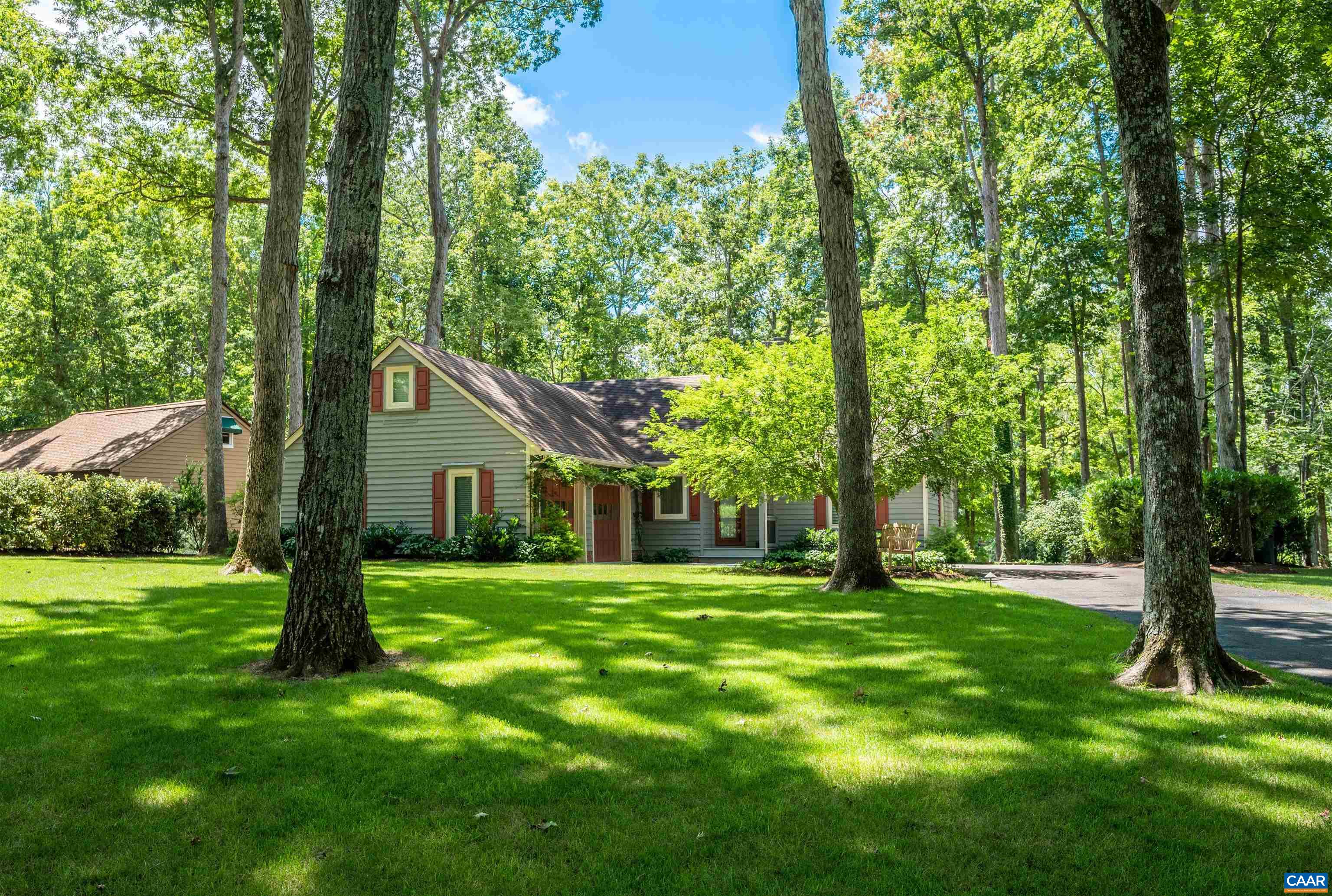 32 Out Of Bounds Road Palmyra, VA 22963 - Photo 1 of 55 a backyard of a house with lots of green space and fountain