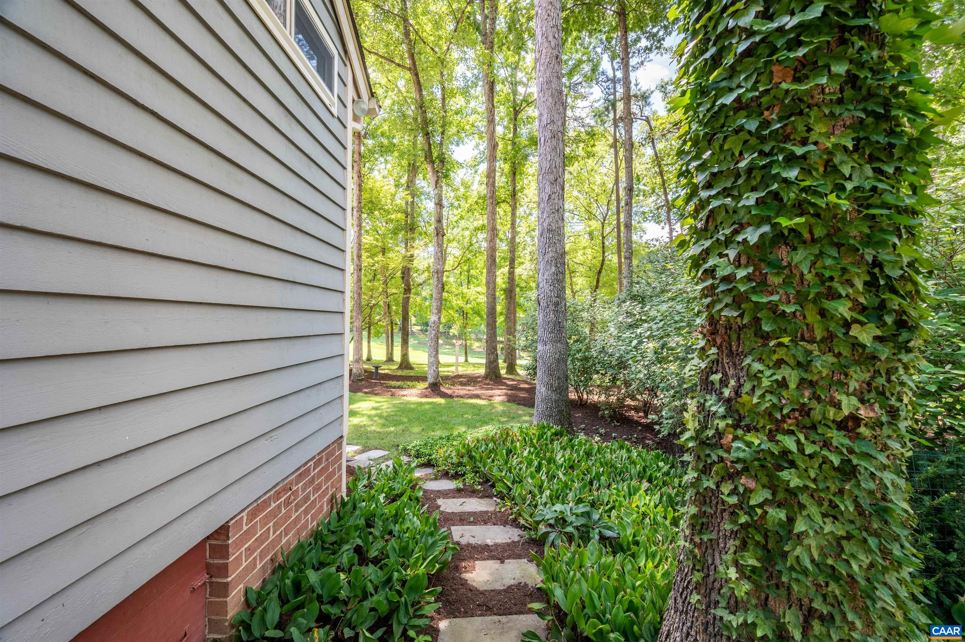 32 Out Of Bounds Road Palmyra, VA 22963 - Photo 35 of 55 a view of a pathway with a garden