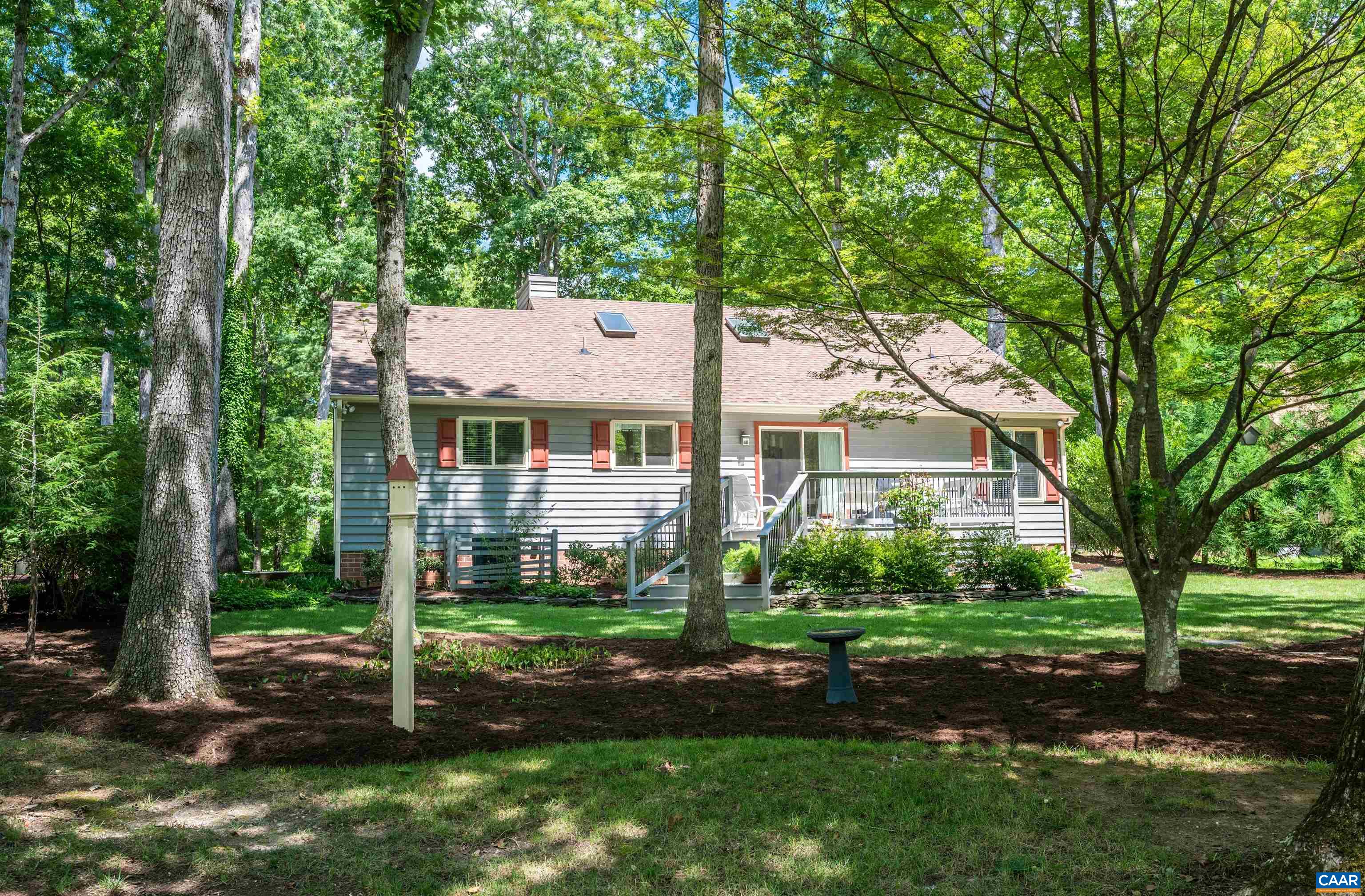 32 Out Of Bounds Road Palmyra, VA 22963 - Photo 38 of 55 a view of house with a big yard plants and large trees
