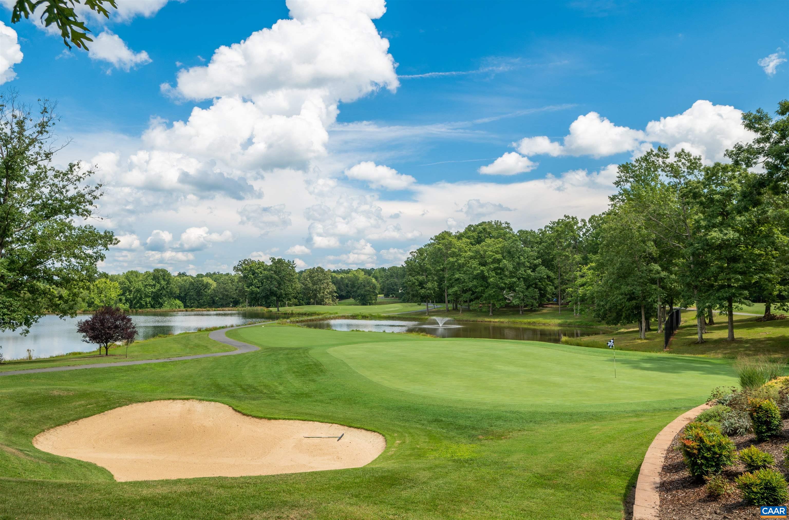 32 Out Of Bounds Road Palmyra, VA 22963 - Photo 46 of 55 a view of a golf course with a lake view