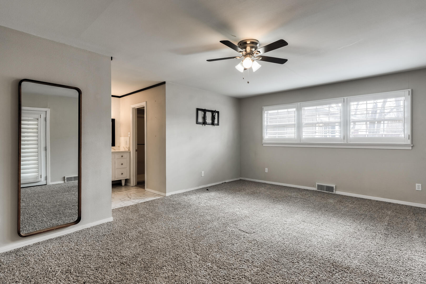 3303 53rd Street Lubbock, TX 79413 - Photo 34 of 72 a view of an empty room with a window