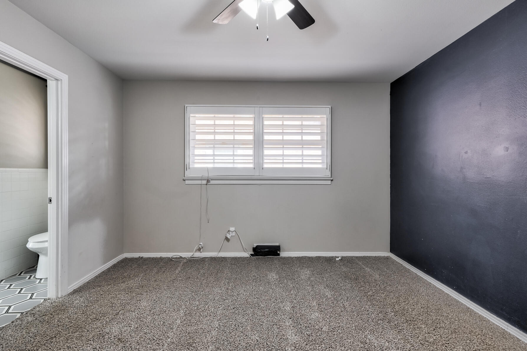 3303 53rd Street Lubbock, TX 79413 - Photo 43 of 72 an empty room with a empty space and a window