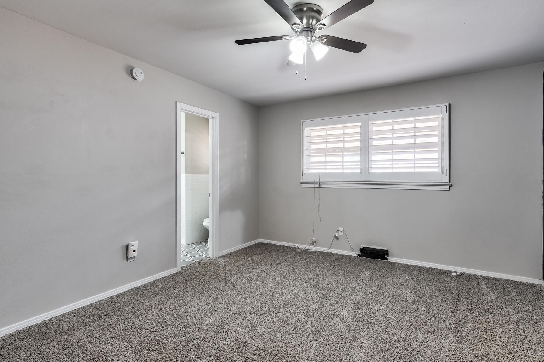 3303 53rd Street Lubbock, TX 79413 - Photo 44 of 72 a view of an empty room with a window