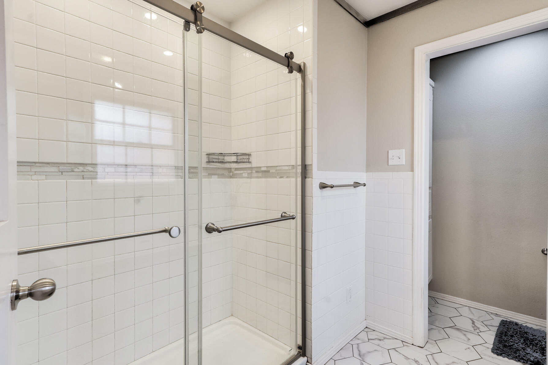 3303 53rd Street Lubbock, TX 79413 - Photo 47 of 72 a bathroom with a shower
