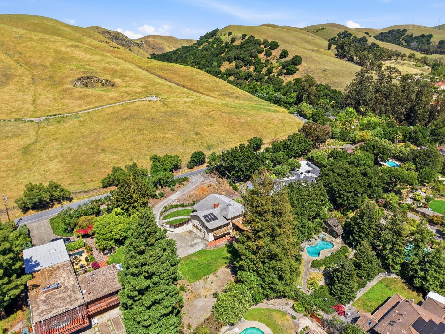 208 Mill Creek Road Fremont, CA 94539 - Photo 56 of 59 an aerial view of residential houses with outdoor space