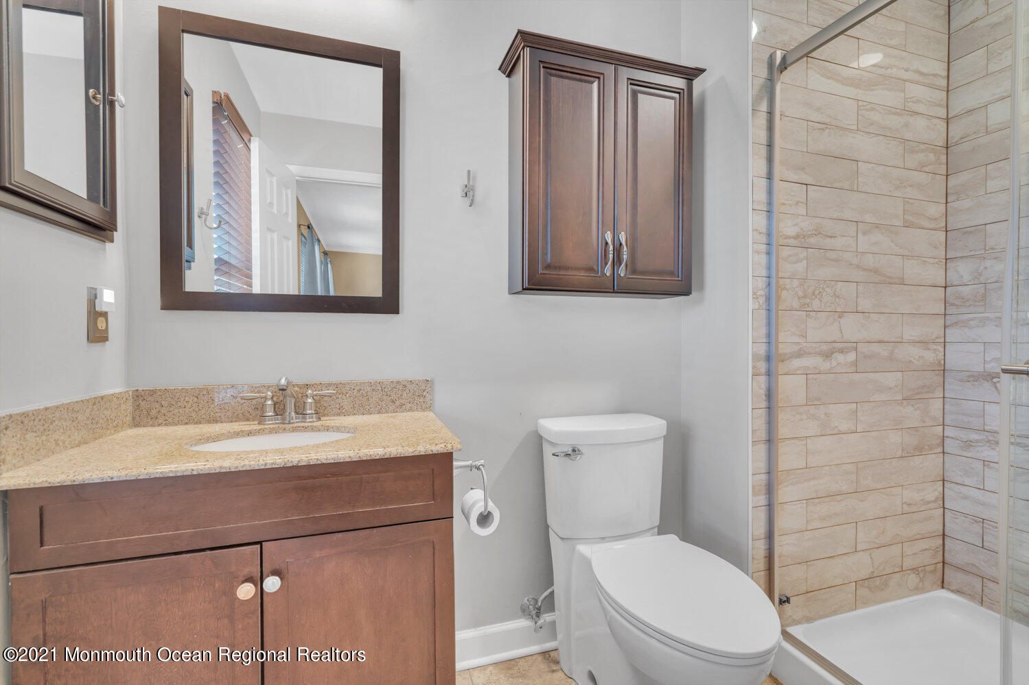 181 Friendship Road Howell, NJ 07731 - Photo 22 of 36 a bathroom with a toilet sink vanity and mirror