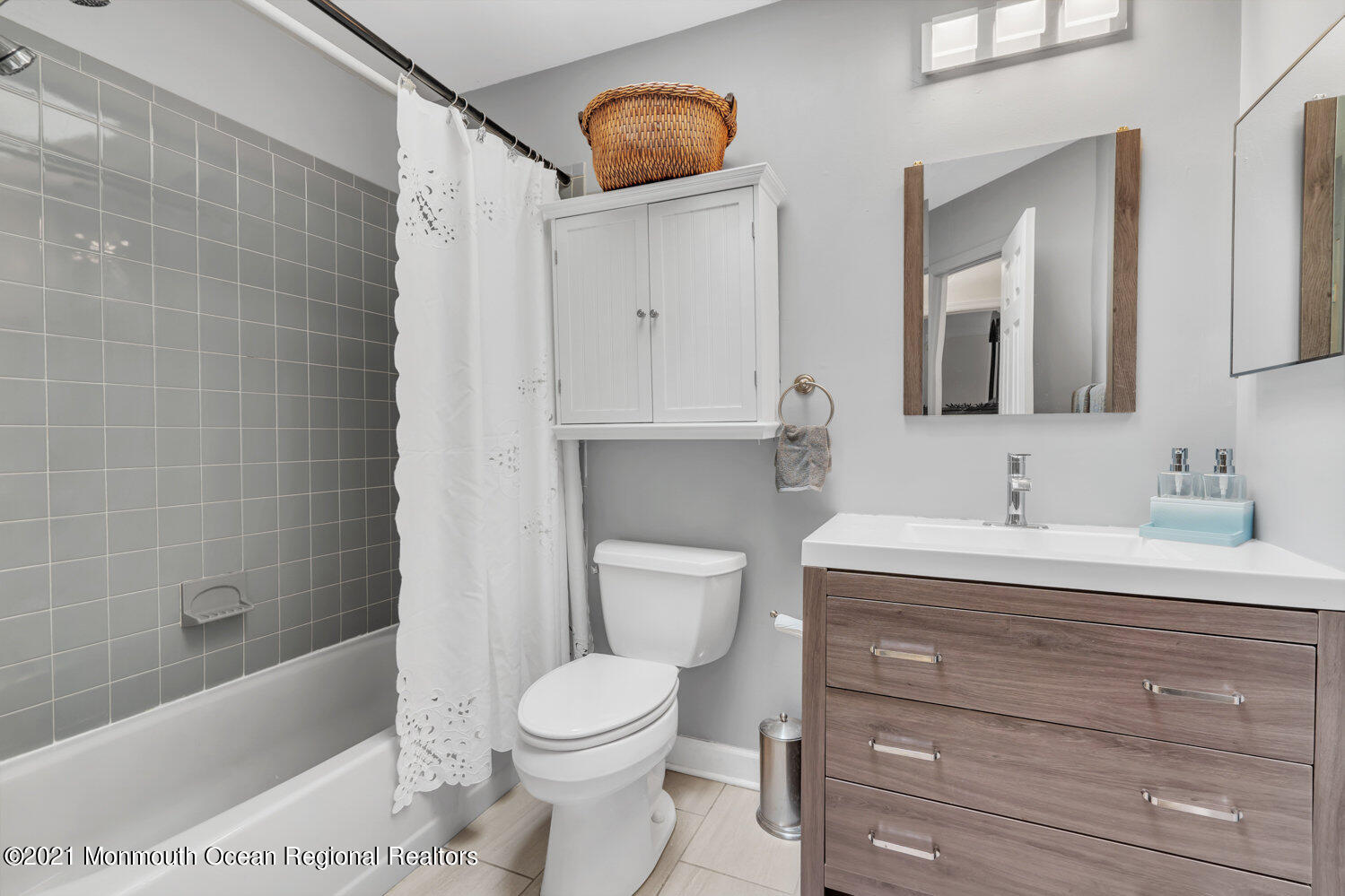181 Friendship Road Howell, NJ 07731 - Photo 26 of 36 a bathroom with a bathtub a sink a toilet and a mirror