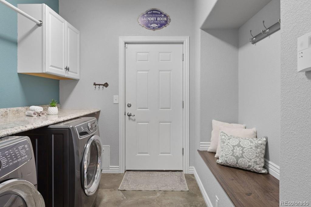 3050 Native Court Wellington, CO 80549 - Photo 30 of 50 a utility room with dryer and washer