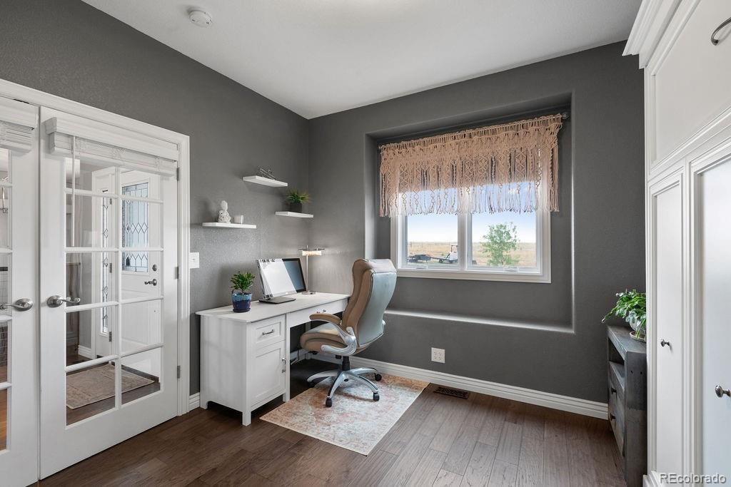 3050 Native Court Wellington, CO 80549 - Photo 32 of 50 a workspace with furniture and a window