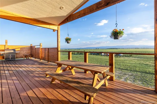 a view of swimming pool with seating space