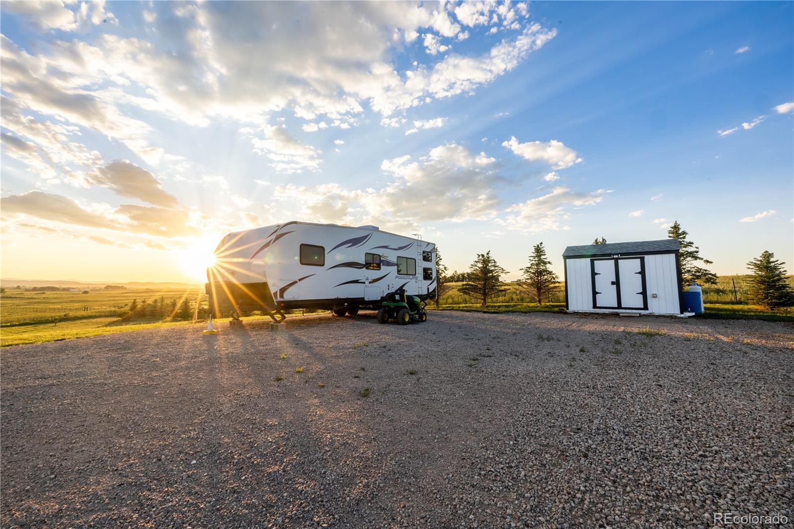 3050 Native Court Wellington, CO 80549 - Photo 47 of 50 a view of a lake with houses