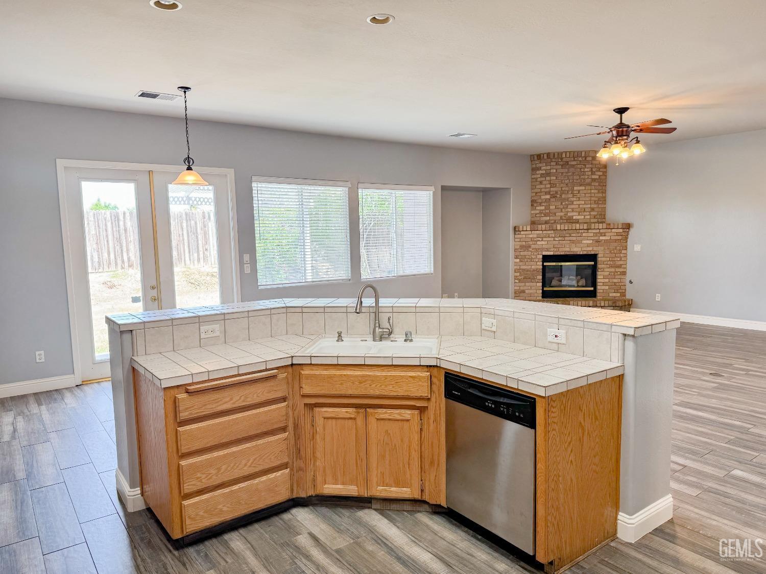Undisclosed Address Bakersfield, CA 93312 - Photo 11 of 28 a kitchen with a sink and a stove