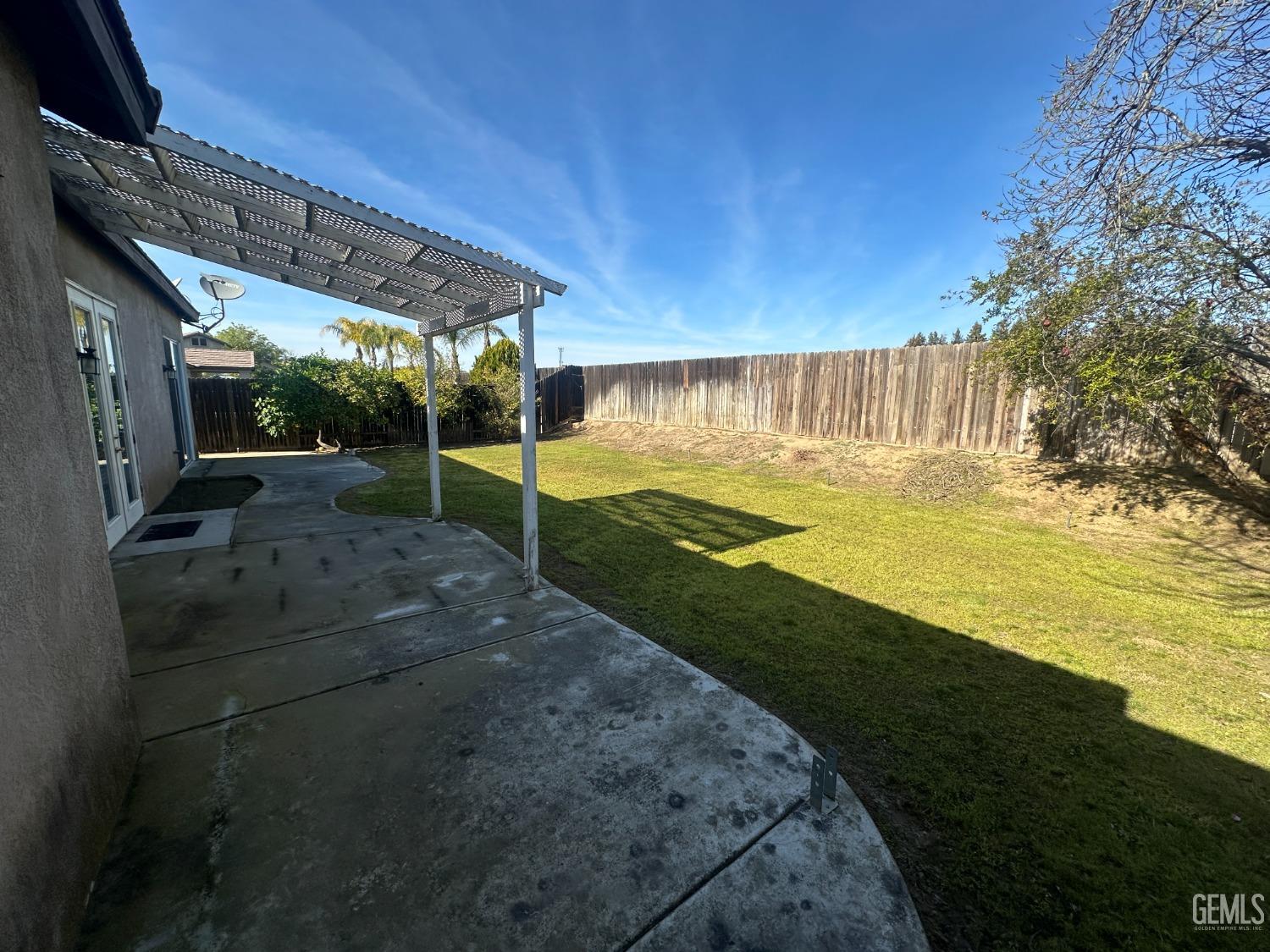 Undisclosed Address Bakersfield, CA 93312 - Photo 27 of 28 a view of a backyard