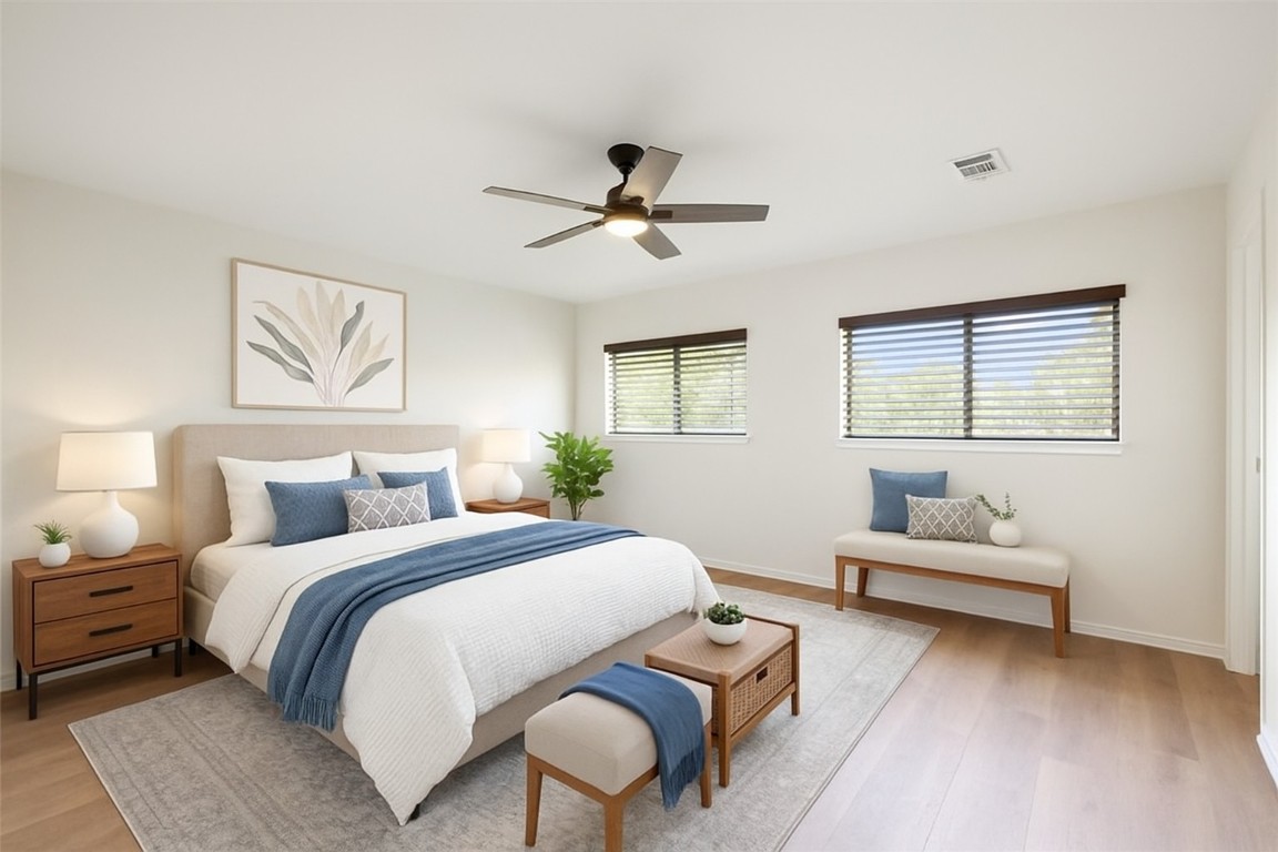 1539 Apollo Circle Round Rock, TX 78664 - Photo 12 of 26 a bedroom with a bed and furniture