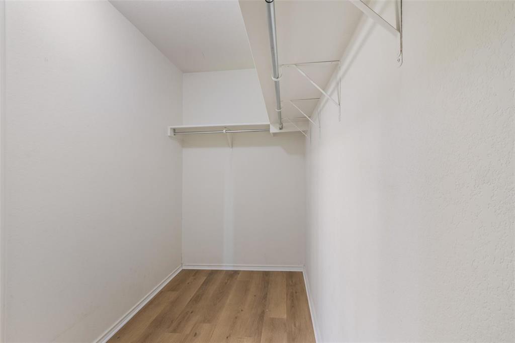 1539 Apollo Circle Round Rock, TX 78664 - Photo 14 of 26 a view of walk in closet with empty racks