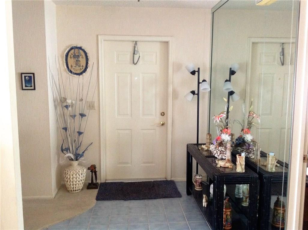 23296 Southwest 58th Avenue, Unit B Boca Raton, FL 33428 - Photo 1 of 22 Mirrored Foyer Area