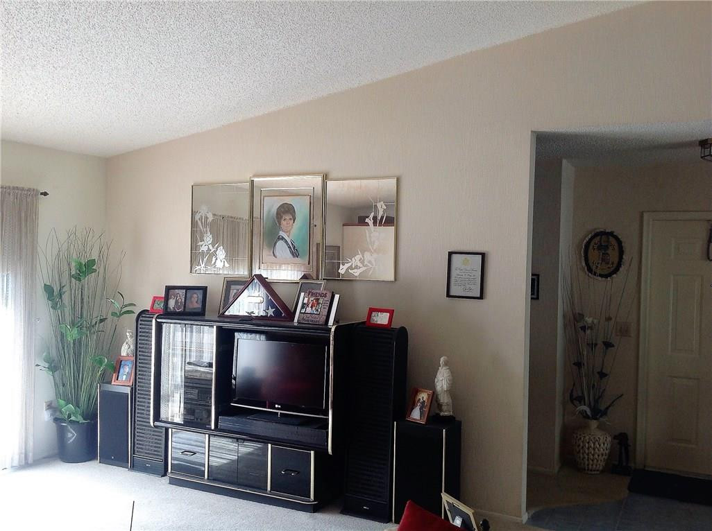 23296 Southwest 58th Avenue, Unit B Boca Raton, FL 33428 - Photo 3 of 22 Plush carpet in Living room