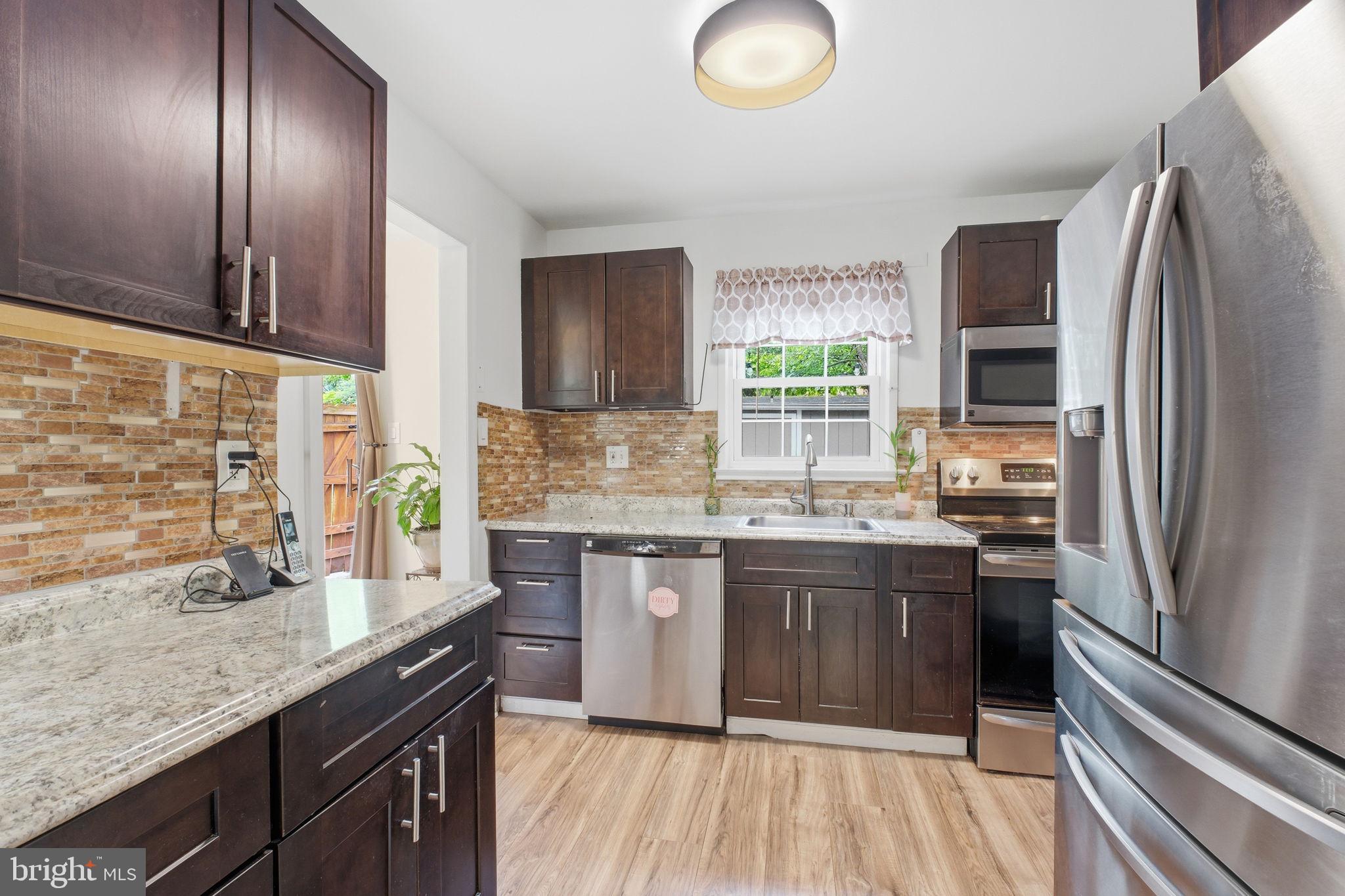 7709 Matisse Way Springfield, VA 22153 - Photo 11 of 27 Plenty of 42-inch kitchen cabinetry