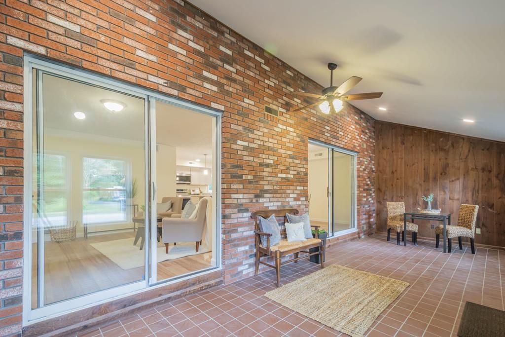 1 Kingman Road Acton, MA 01720 - Photo 2 of 42 a living room with furniture a large window and chairs
