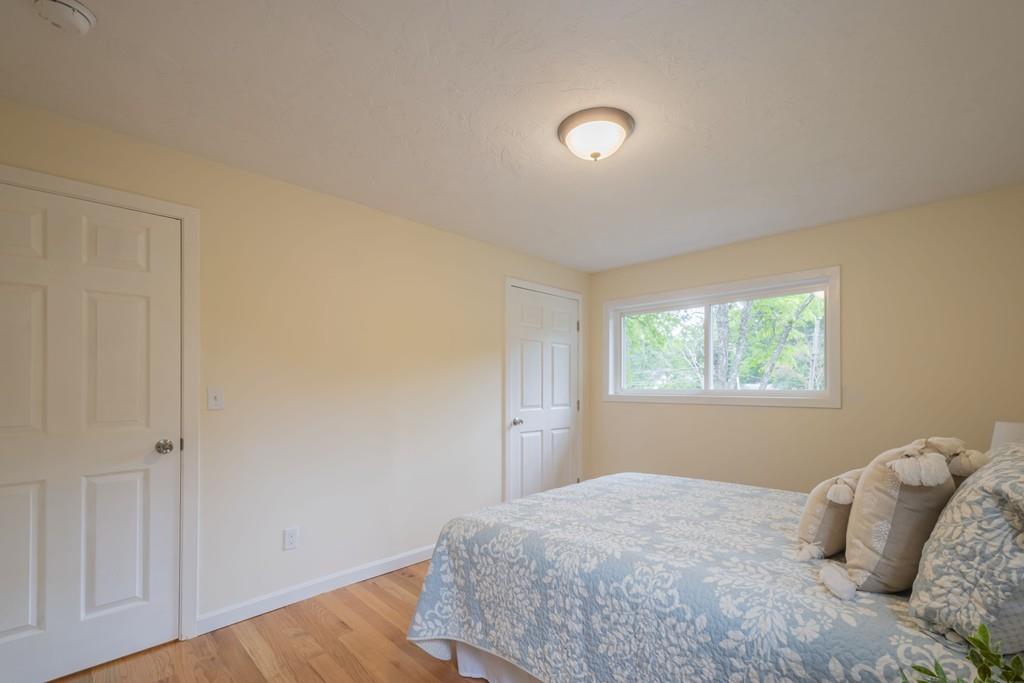1 Kingman Road Acton, MA 01720 - Photo 36 of 42 a bedroom with a bed and a window