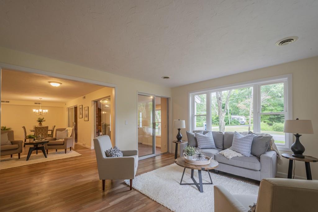 1 Kingman Road Acton, MA 01720 - Photo 7 of 42 a living room with furniture and a large window